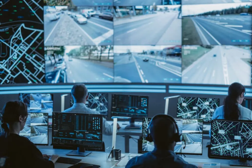 Traffic monitoring control centre with operators and screens